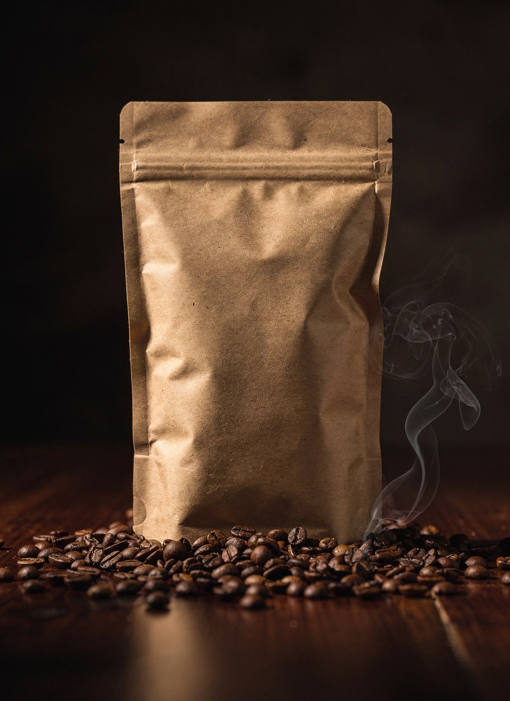 A kraft-paper coffee bag bursting with roasted beans on dark wood